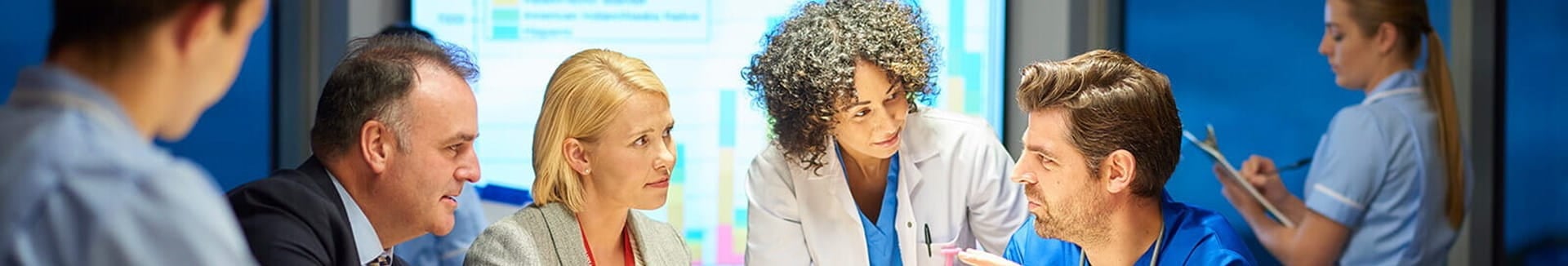 nursing leaders strategizing at a table