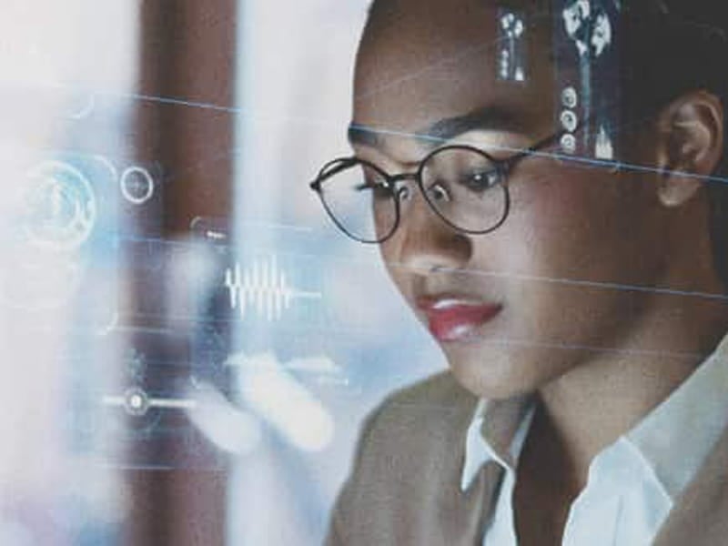 Young Woman looking at data.