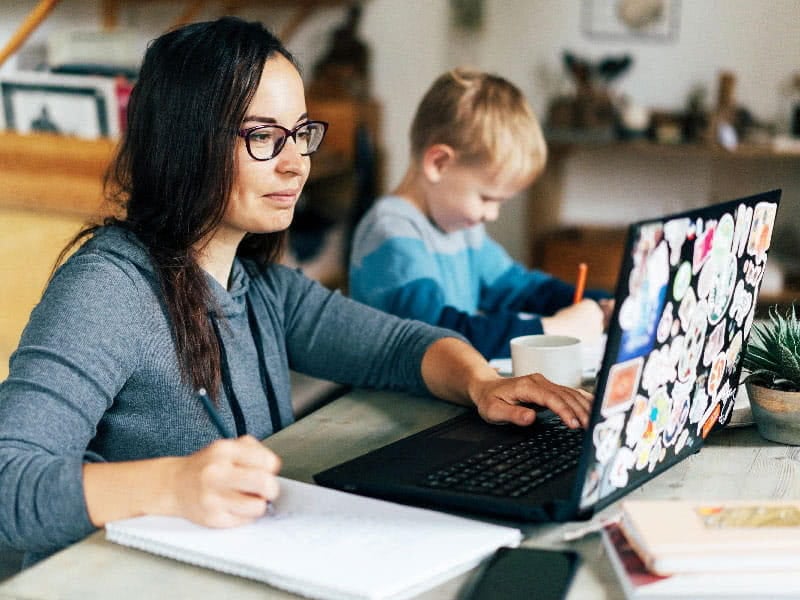 Mother working from home.