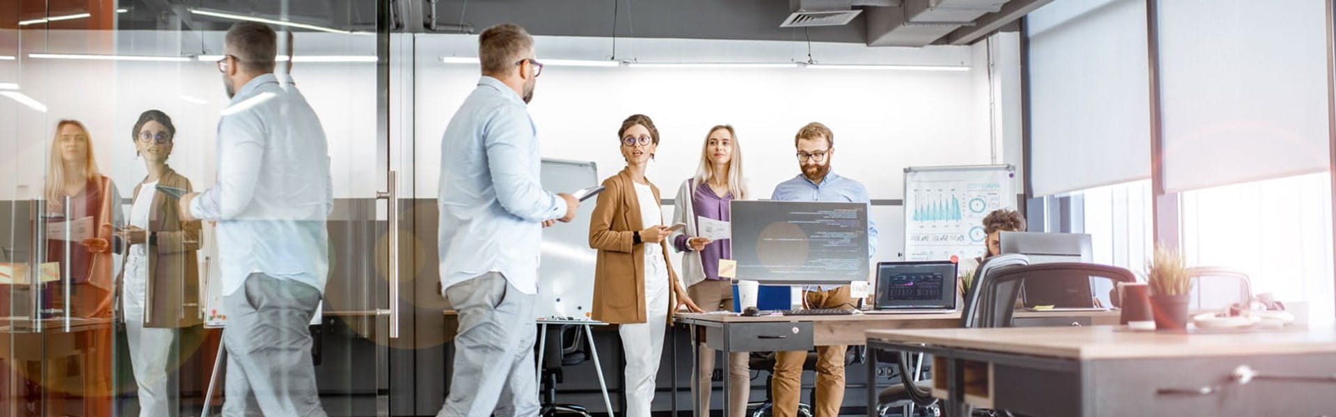 group of colleagues working together in a modern office environment