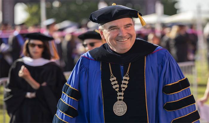 UMass Global Chancellor Dr. David Andrews wearing academic regalia during Southern California Commencement 2022.