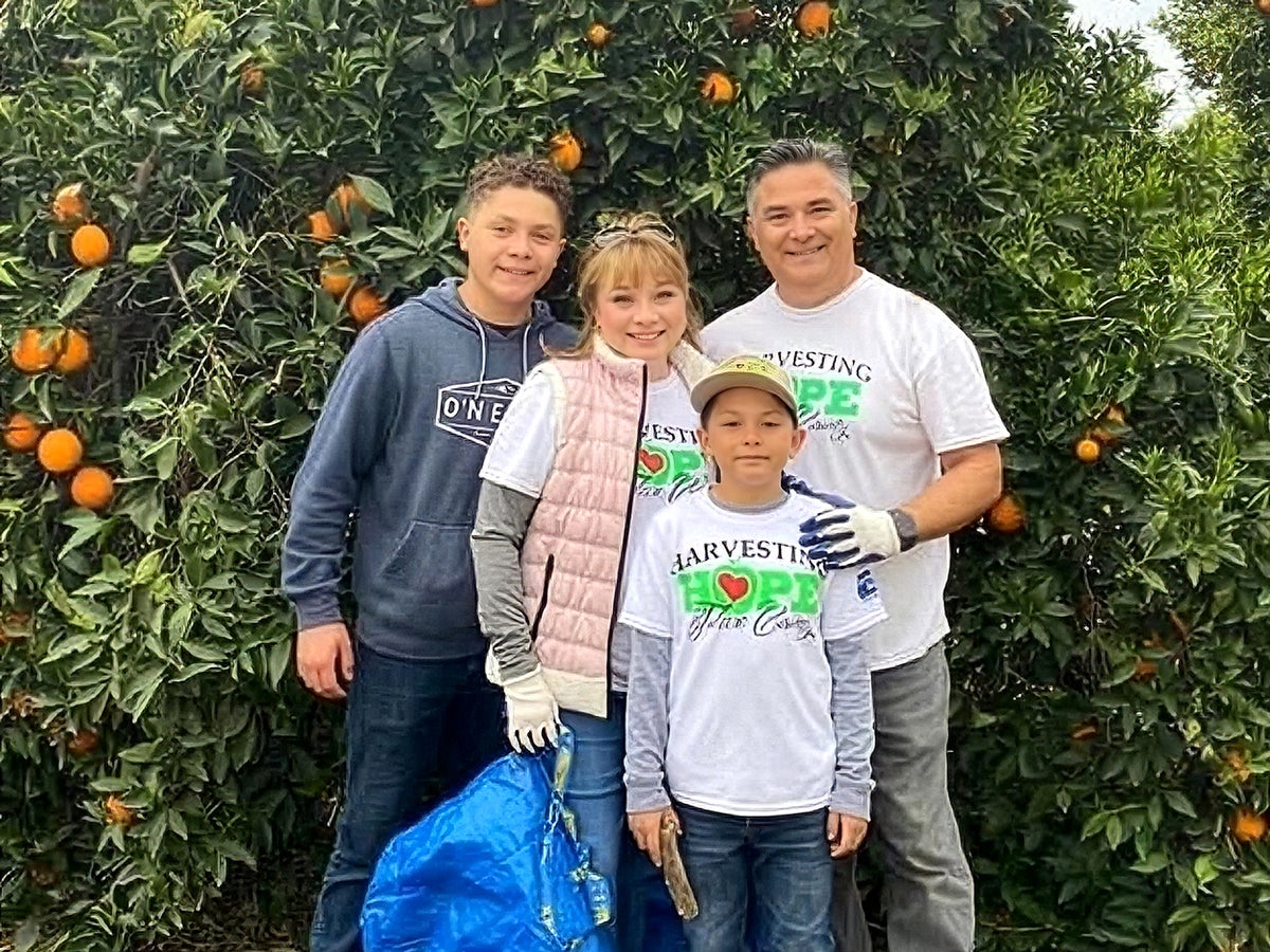 UMass Global staff member, Sonia, with her family