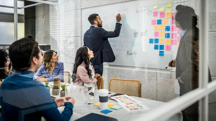 Project manager in a team meeting