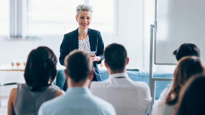 Businesswoman leading a training class for professionals