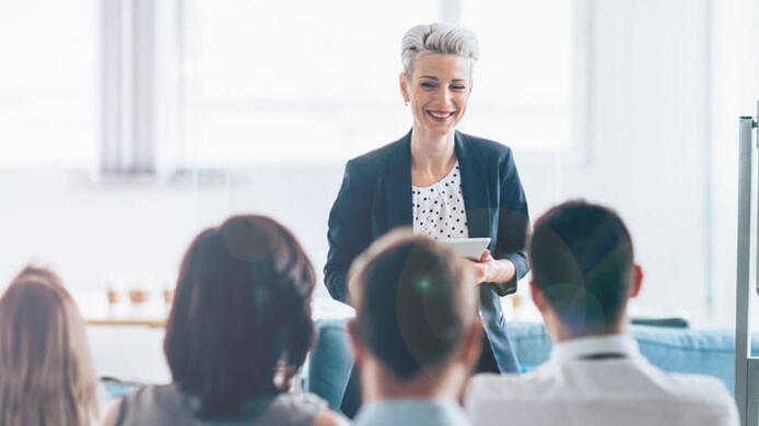 two women in higher ed having a conversation