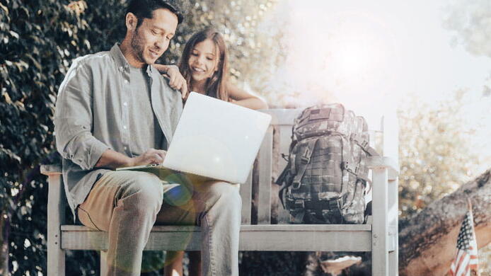 military man and a kid sitting together