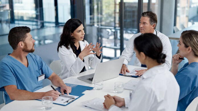 healthcare professionals discussing something