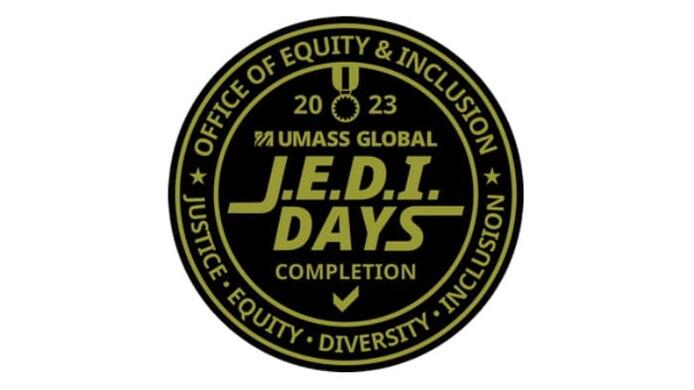 A round gold and black emblem is pictured with the text, Office of Equity & Inclusion. Justice. Equity. Justice. Inclusion on the outer rim. On the inside reads the text, 2023 UMass Global J.E.D.I. Days Completion