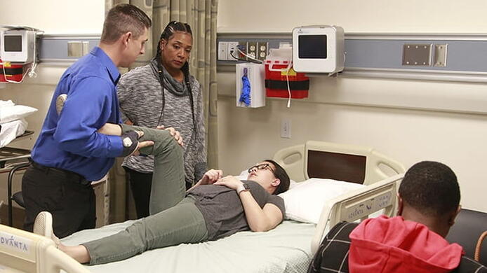 A nursing faculty member teaches students