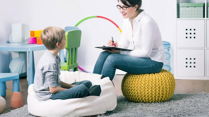 Counselor with child