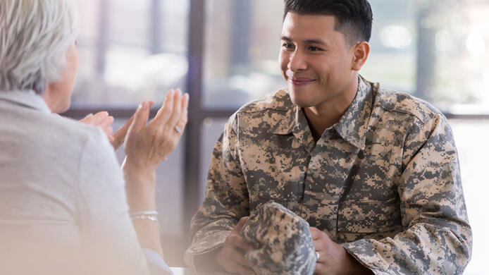 Military and lady talking