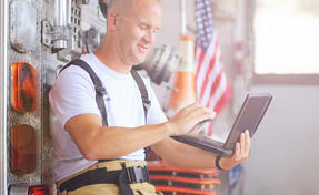 Firefighter on a laptop