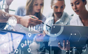 Concept of digital diagram,graph interfaces,virtual screen,connections icon on blurred background.Coworking team meeting