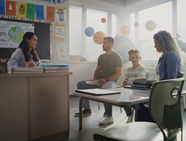 Teacher talking with parents