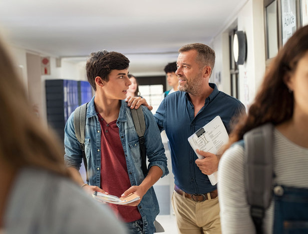 Professor talking to student