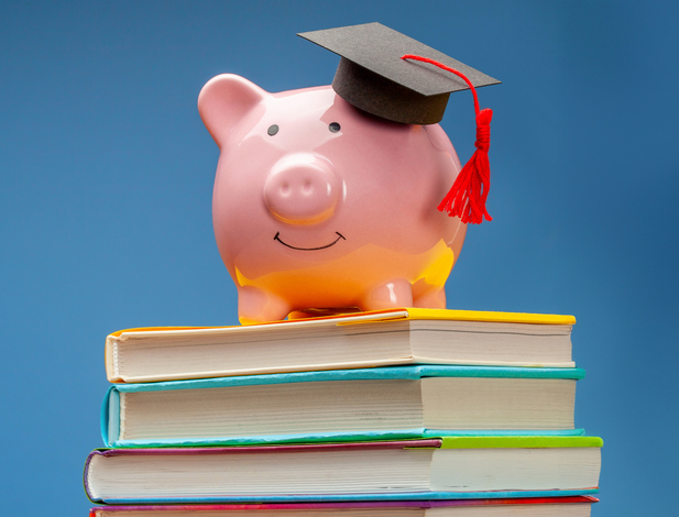 Piggy bank on a stack of books