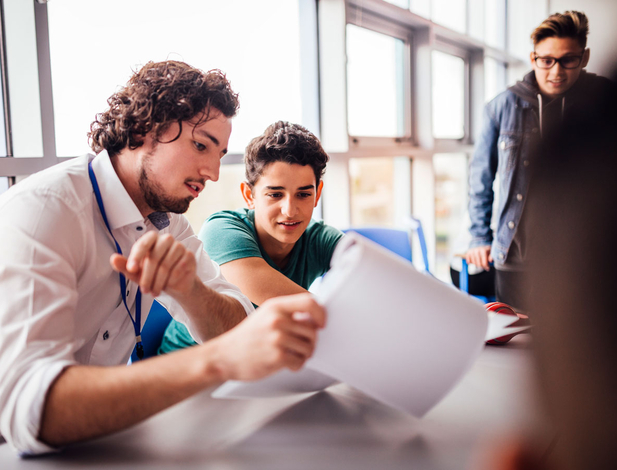 Highschool teacher with students