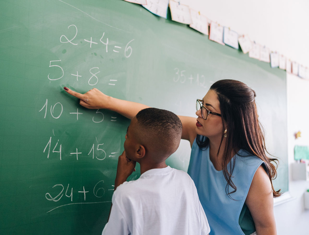 Math teacher with student