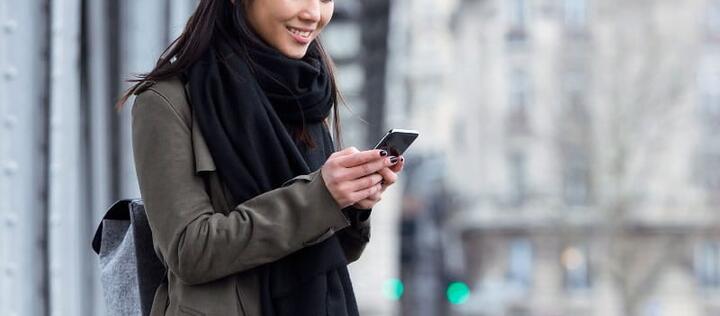 female_looking_at_news_on_phone