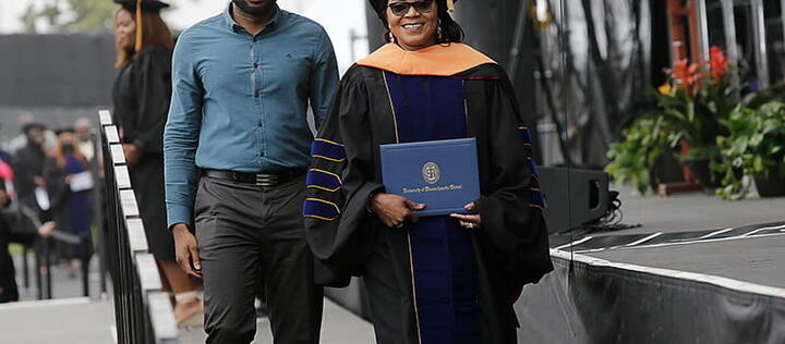 UMass Global DNP Grad with Family Member