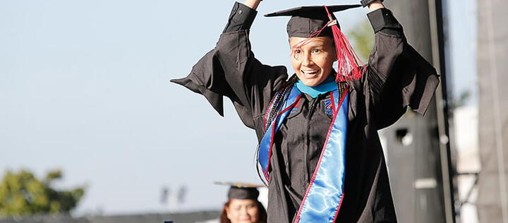 UMass Global Grad Happy at Commencement