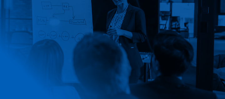 female facilitator leading a corporate training course