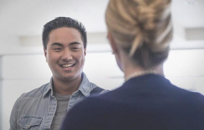 A business student smiling.