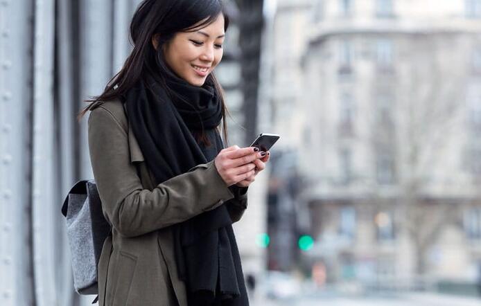 female_looking_at_news_on_phone
