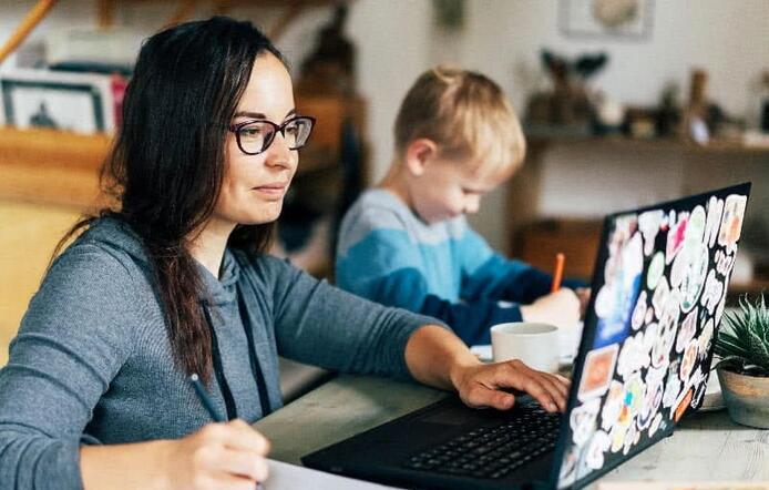 Mother working from home.