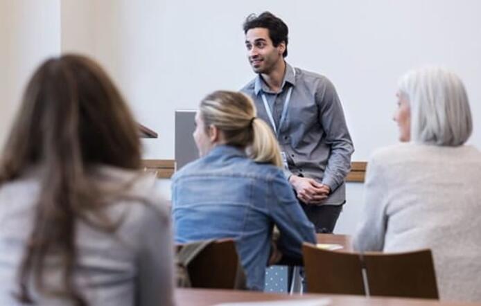 School_District_Administrator_talking_to _group
