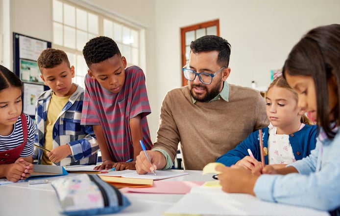 Elementary teacher in class with students