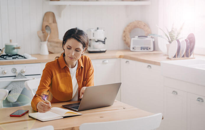 Online student in the kitchen