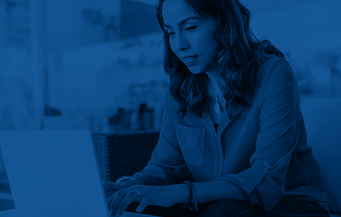 UMassGlobal Student studying from home