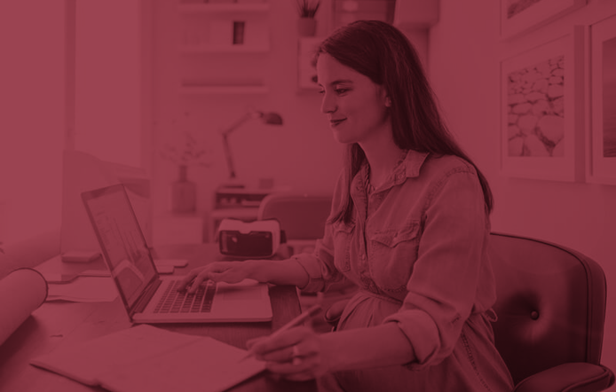 pregnant_female_at_computer_taking_notes_at_her_desk_800x600.jpg