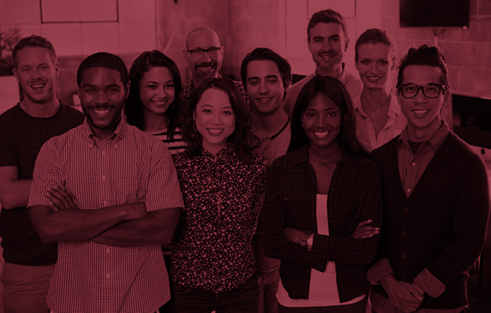 A group of diverse people posing for a photo.