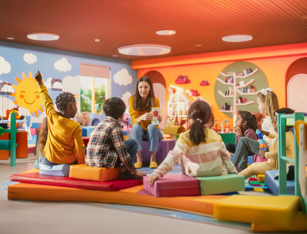 Kindergarten teacher with children